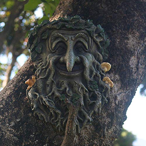 Green Man Face Sculpture